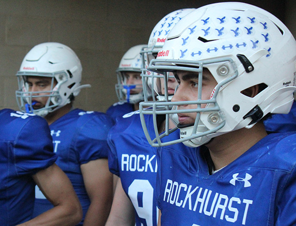 Junior defensive back Luke Kuechler waits with his teammates to run out onto the field ahead of Rockhursts game against Liberty North on Sept. 8, 2023.