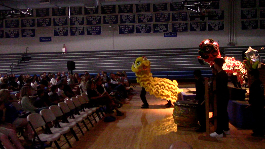 The Lion Dance team performs for prospective students and parents at Night at the Rock on Sept. 26, 2023.