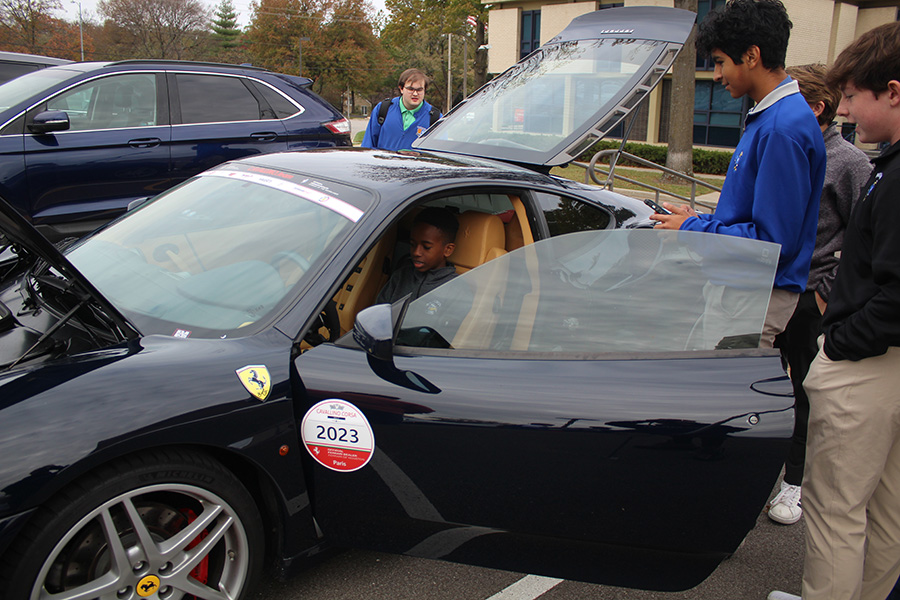 Students+check+out+the+2005+Ferrari+F430+at+the+first+ever+auto+show+hosted+by+the+Automotive+Club+on+Nov.+3%2C+2023.