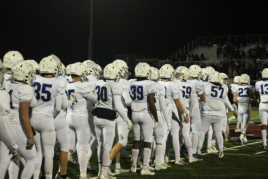 Rockhurst players line up to shake hands with Lees Summit North after beating the Broncos on Nov. 10, 2023 to claim the district championship. Its the Hawklets first district crown in football since 2018.