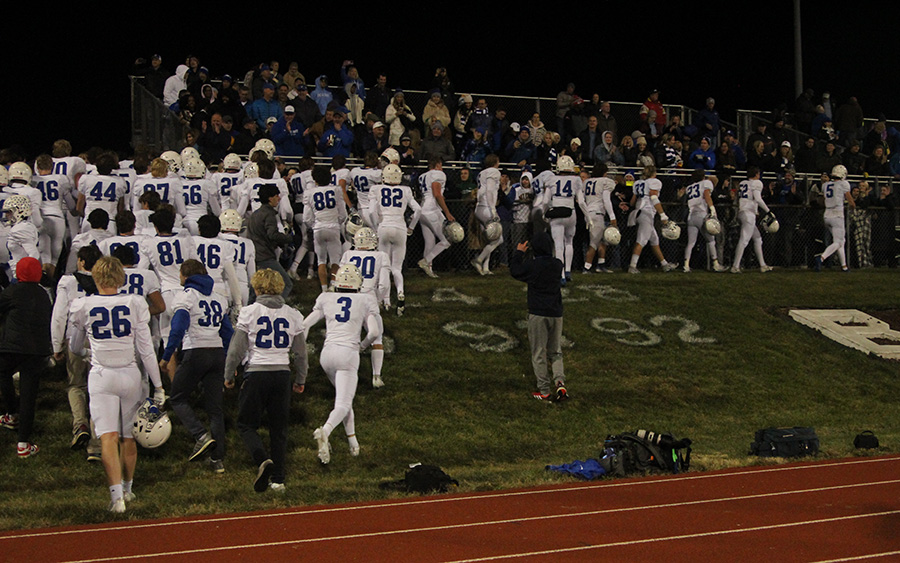 The team celebrates with fans and parents after beating Lees Summit North on Nov. 10, 2023 to claim the district championship. Its the Hawklets first district crown in football since 2018.