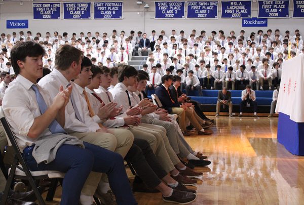 Seniors clap along with the music during the Black History Month Mass on Feb. 2, 2024. The mass is traditionally the most spirited of the school year. The choir from St. Monica Catholic Church brings their special renditions of traditional mass songs, which often leads to clapping, hoots and hollering from the student body.