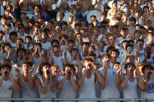 The student section yells in unison during the varsity football game against St. Pius X on Aug. 30, 2024.