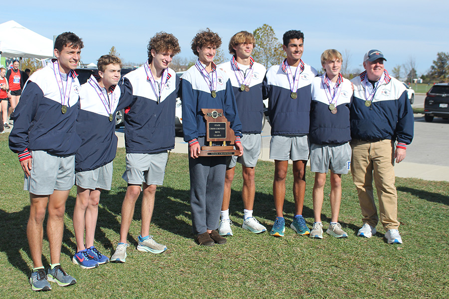 The cross country team poses with the state championship trophy on Nov. 8, 2024. The team won by 25 points, with the average for their top 7 finishers more than 13 seconds better than the 2nd place school.
Left to right: Bill Hayes, Jack Morrison, Justin Waldron, Henry Acorn, Andrew Davis, Kai Somasegaran, Jack McGovern and coach Michael Dierks