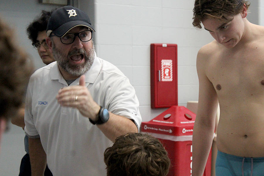 Head coach Paul Winkeler urges his team on during Day 2 of the Missouri Class 2 swim and dive championship on Nov. 15, 2024. Rockhurst would finish second as a team.