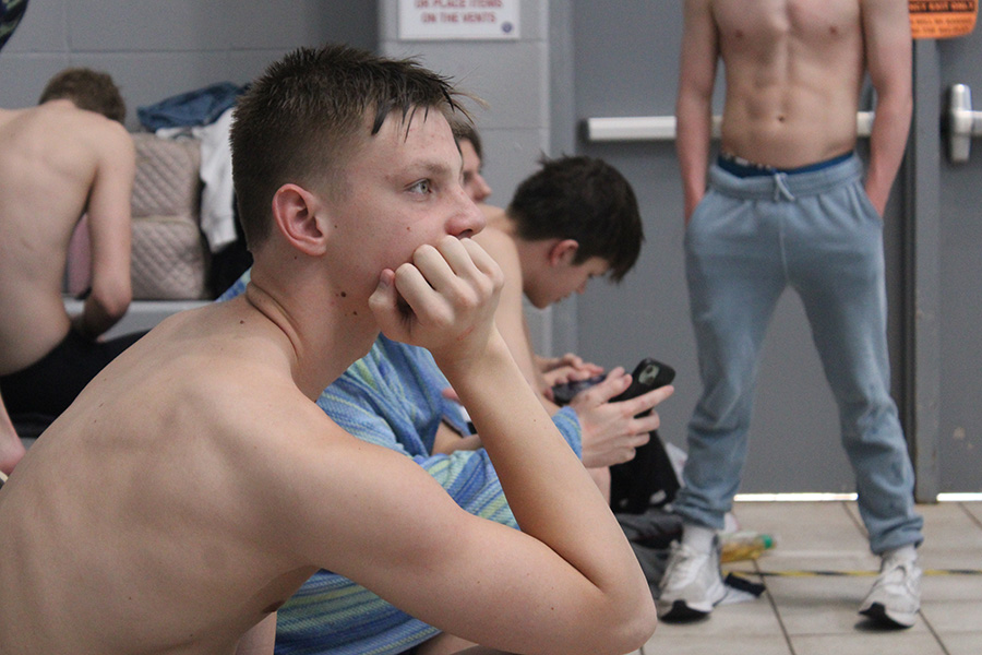 Senior Andy Baklanov watches the action during Day 2 of the Missouri Class 2 swim and dive championship on Nov. 15, 2024. Baklanov won his two individual events, the 100 yard backstroke and 200 yard IM, and finished second as part of two relays.