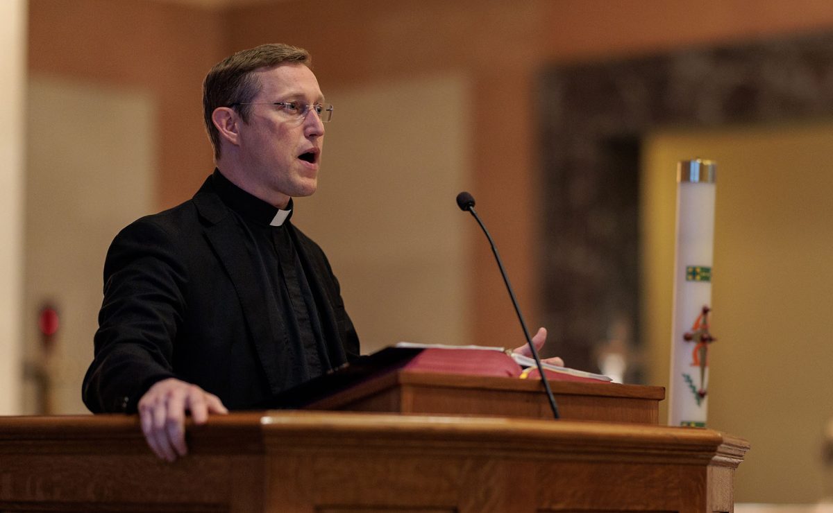 Fr. Stephen Kramer SJ leads a reflection at Jesuit High School in New Orleans