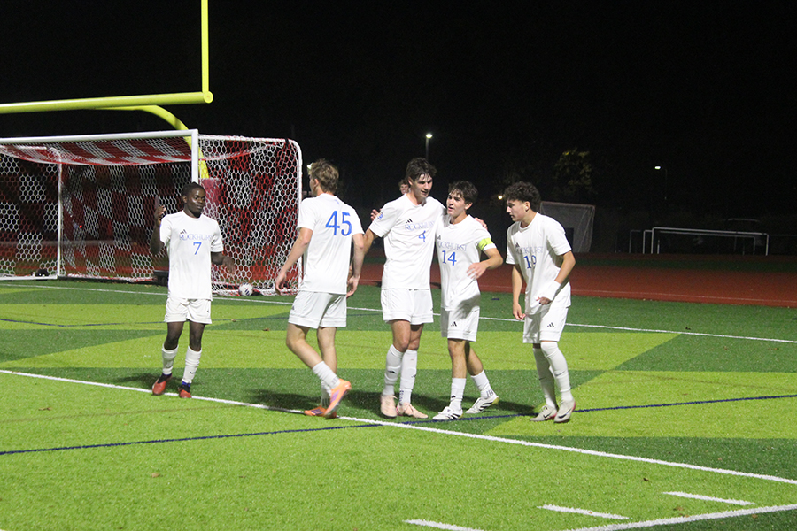 Asende Welongo, Michael Gary, Calvin Schieffer, Liam Dean and Connor Dierks celebrate after Gary scored the first goal of the match against Pembroke Hill on Oct. 7, 2025. The Hawklets would go on to add three more goals en route to a 4-0 win.