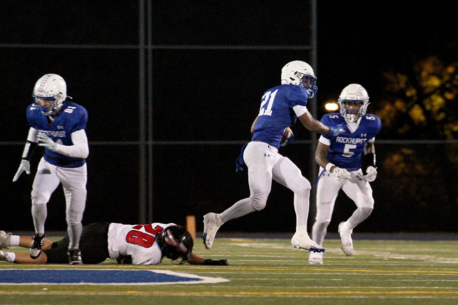 Sophomore running back Ben Hayes hops out of an attempted tackle before sprinting down the sideline for a 70-yard touchdown during the fourth quarter of the district semifinal game against Fort Osage on Nov. 7, 2025. It was the last touchdown of the game for Rockhurst, but they didn't need more as they soared to a 41-13 win.