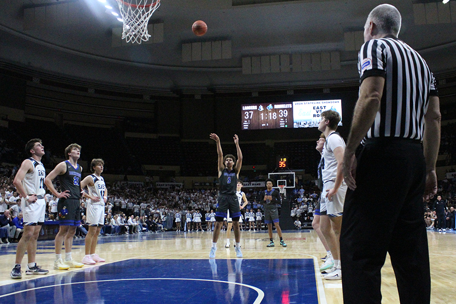 Senior Hueston Saunders shoots a free throw in the third quarter of the rivalry game against Shawnee Mission East on Jan. 30, 2026. Saunders scored 14 points in the Hawklets' 56-51 win, their fourth straight in the series. This was the first year the game was played at Municipal Arena in downtown Kansas City as opposed to on the campus of one of the schools.