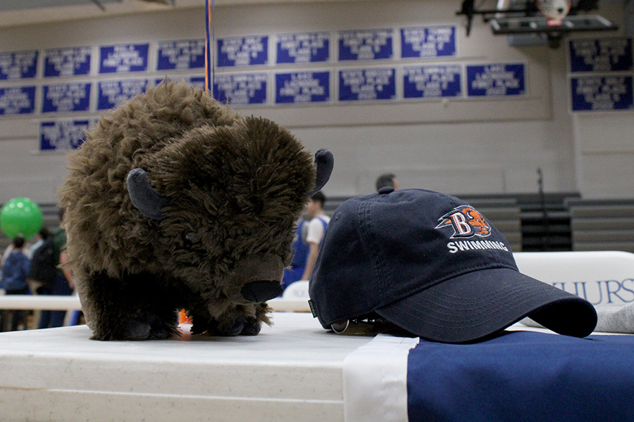 A stuffed buffalo and Bucknell University swimming hat remain on the table for senior Josh Battison after the Signing Day ceremony on Feb. 4, 2026.